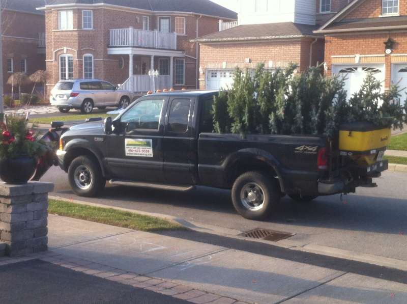 AD Lawn Care work truck on the job
